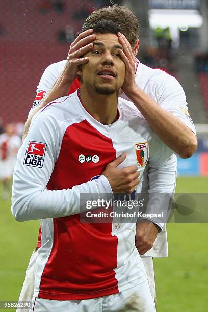 Marcel Ndjeng of Augsburg celebrates the third goal with Daniel Brinkmann of Augsburg during the Second Bundesliga match between FC Augsburg and...