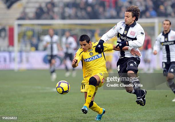 Daniele Galloppa of Parma FC competes for the ball with Alexis Alejandro Sanchez of Udinese Calcio during the Serie A match between Parma and Udinese...