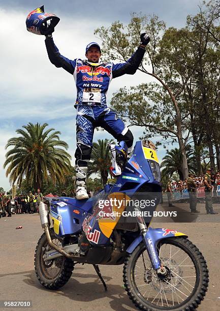 France's Cyril Despres celebrates after the 14th stage of the Dakar 2010, between Santa Rosa and Buenos Aires, Argentina on January 16, 2010....