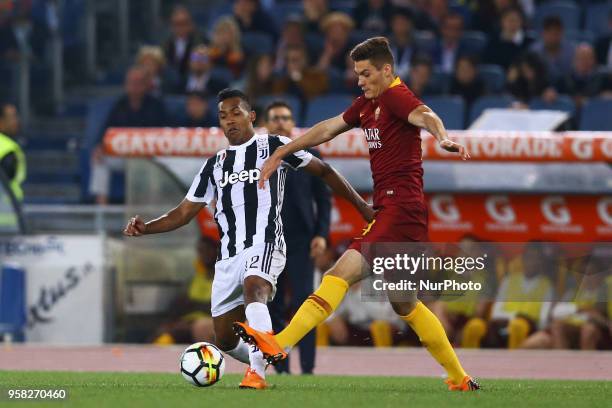 Alex Sandro of Juventus and Patrik Schick of Roma at Olimpico Stadium in Rome, Italy on May 13, 2018 during Serie A match between AS Roma and...