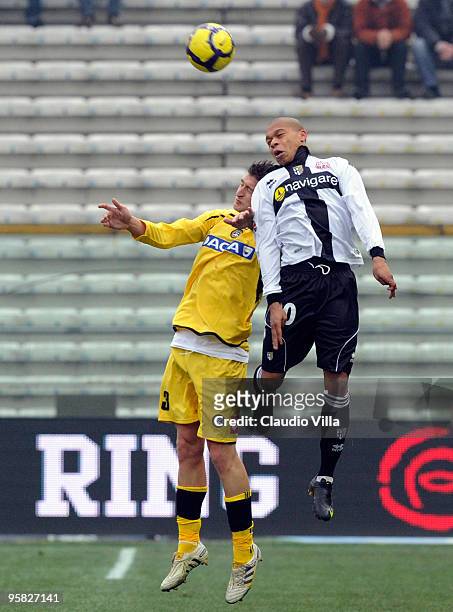 Jonathan Biabiany of Parma FC competes for the ball with Giovanni Pasquale of Udinese Calcio during the Serie A match between Parma and Udinese at...