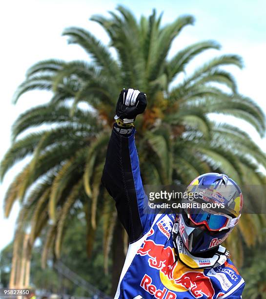 France's Cyril Despres celebrates after the 14th stage of the Dakar 2010, between Santa Rosa and Buenos Aires, Argentina on January 16, 2010....