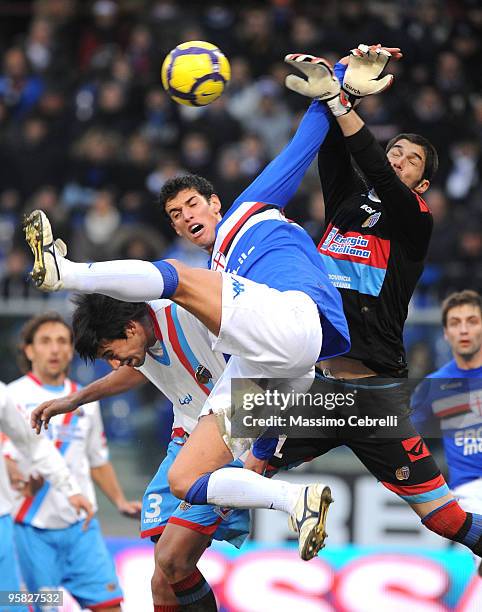 Marco Rossi of UC Sampdoria goes up for the the ball against Mariano Gonzalo Andujar of Catania Calcio during the Serie A match between UC Sampdoria...