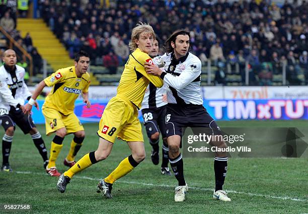 Christian Zaccardo of Parma FC competes for the ball with Dusan Basta of Udinese Calcio during the Serie A match between Parma and Udinese at Stadio...