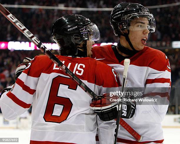 Travis Hamonic and Ryan Ellis celebrate a goal during the 2010 IIHF World Junior Championship Tournament game against Team USA on December 31, 2009...