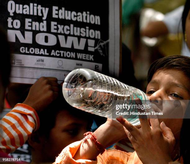 Child activists of National Coalition for Education raising slogan during a rally demanding right to education be immediately enacted to ensure...