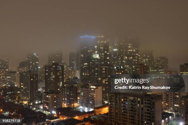 misty night in sparkling city - ontario canada stock pictures, royalty-free photos & images
