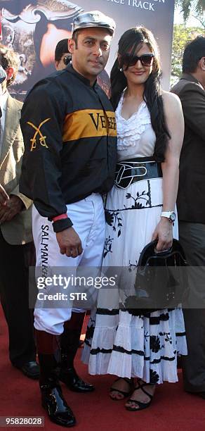 Indian Bollywood actor Salman Khan and Zarine Khan attend a promotional event for the Hindi film "Veer" at a race course in Mumbai on January 17,...