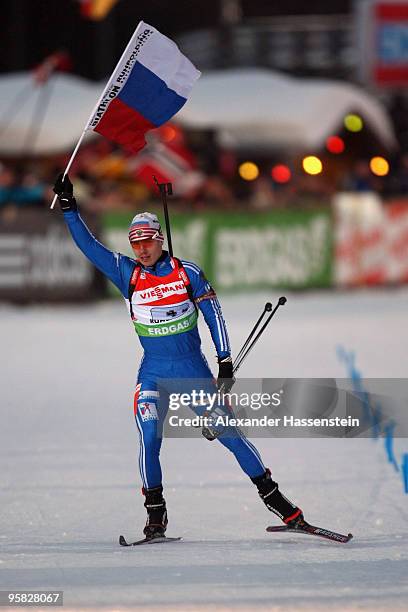 Evgeny Ustygov of Russia celebrates winning the Men's 4 x 7,5km Relay in the e.on Ruhrgas IBU Biathlon World Cup on January 17, 2010 in Ruhpolding,...