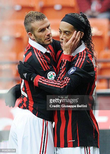 David Beckham and Ronaldinho of Milan celebrate the opening goal a penalty, during the Serie A match between Milan and Siena at Stadio Giuseppe...