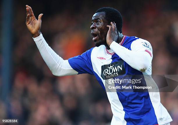 Chris Samba of Blackburn celebrates his goal by gesturing to the home fans during the Barclays Premier League match between Blackburn Rovers and...