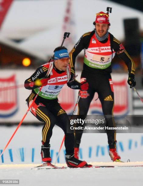 Alexander Wolf of Germany hands over to Michael Greis during the Men's 4 x 7,5km Relay in the e.on Ruhrgas IBU Biathlon World Cup on January 17, 2010...