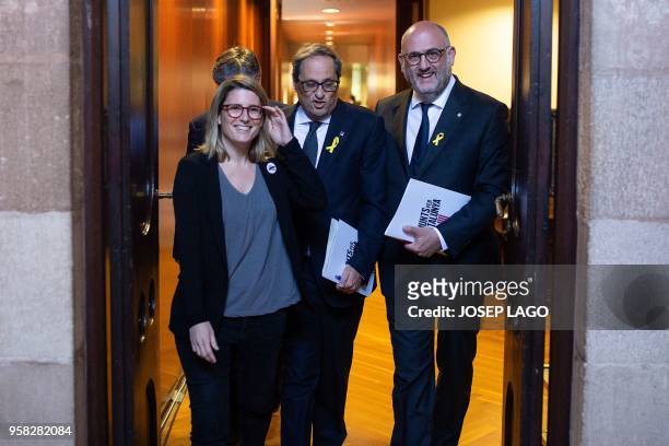 Junts per Catalonia MP and presidential candidate Quim Torra and Junts per Catalonia MPs Elsa Artadi and Eduard Pujol arrive to attend a vote session...