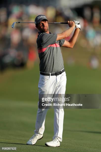 Webb Simpson of the United States plays a shot on the 18th hole during the third round of THE PLAYERS Championship on the Stadium Course at TPC...