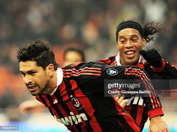 Marco Borriello and Ronaldinho of Milan celebrate the goal during the Serie A match between Milan and Siena at Stadio Giuseppe Meazza on January 17,...