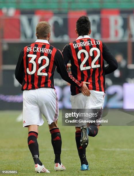 David Beckham and Marco Borriello of Milan celebrate the goal during the Serie A match between Milan and Siena at Stadio Giuseppe Meazza on January...