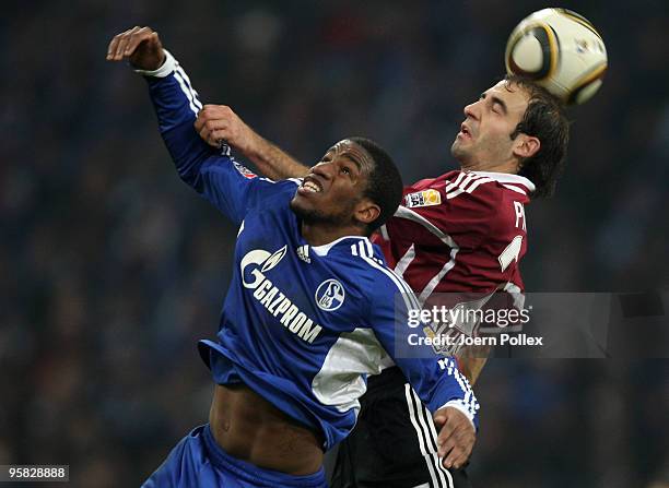 Jefferson Farfan of Schalke and Javier Pinola of Nuernberg battle for the ball during the Bundesliga match between FC Schalke 04 and 1. FC Nuernberg...