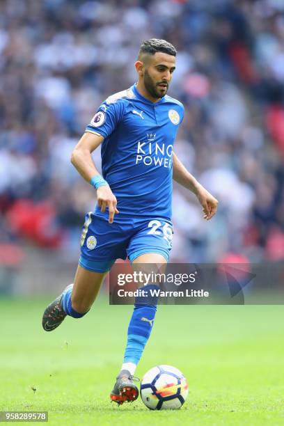 Riyad Mahrez of Leicester City in action during the Premier League match between Tottenham Hotspur and Leicester City at Wembley Stadium on May 13,...