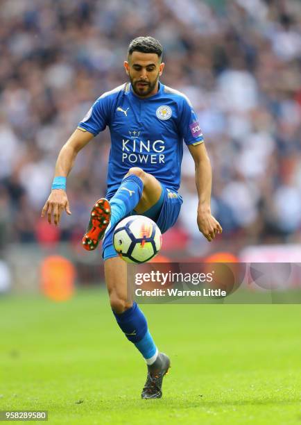 Riyad Mahrez of Leicester City in action during the Premier League match between Tottenham Hotspur and Leicester City at Wembley Stadium on May 13,...