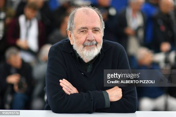 Brazilian director Carlos Diegues poses on May 14, 2018 during a photocall for the film "O Grande Circo Mistico " at the 71st edition of the Cannes...