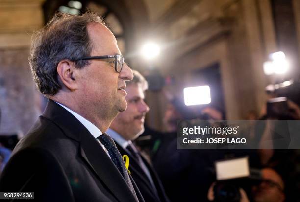 Junts per Catalonia MP and presidential candidate Quim Torra arrives to attend a vote session to elect a new regional president at the Catalan...