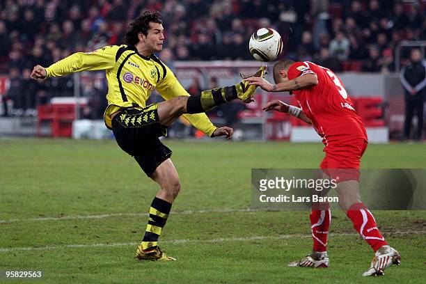 Nelson Valdez of Dortmund challenges Youssef Mohamad of Koeln during the Bundesliga match between 1. FC Koeln and Borussia Dortmund at...