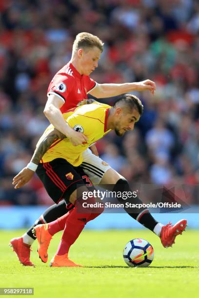 Scott McTominay of Man Utd battles with Roberto Pereyra of Watford during the Premier League match between Manchester United and Watford at Old...