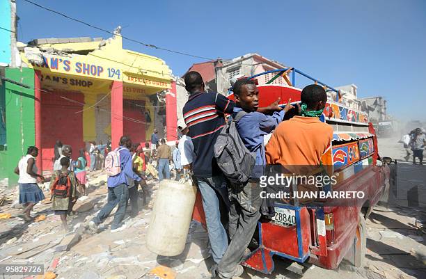 Haitians look for food in Port-au-Prince on Januray 17, 2010. UN Secretary-General Ban Ki-moon headed to Haiti on Sunday to experience first-hand...