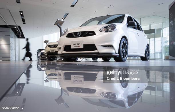 Nissan Motor Co. Vehicles, including the Nissan March Nismo, front, are displayed at the company's headquarters in Yokohama, Japan, on Monday, May...
