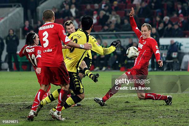 Kevin Grosskreutz of Dortmund scores the winning goal during the Bundesliga match between 1. FC Koeln and Borussia Dortmund at RheinEnergieStadion on...