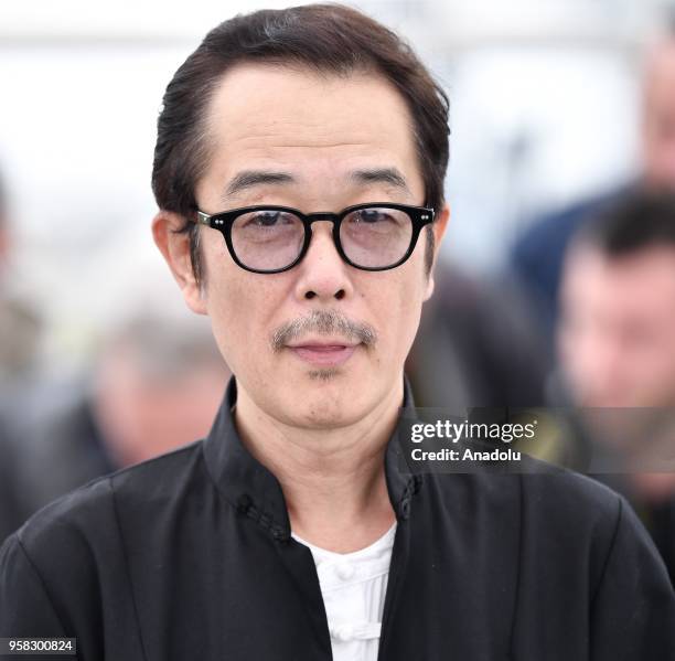 Japanese actor Lily Franky poses for the film Shoplifters ' at the 71st Cannes Film Festival, France on May 14, 2018.