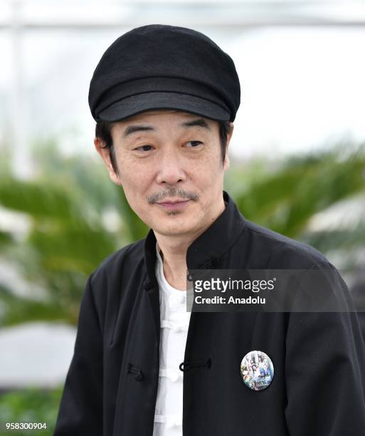 Japanese actor Lily Franky poses for the film Shoplifters ' at the 71st Cannes Film Festival, France on May 14, 2018.