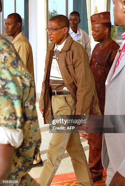 Guinean junta leader Captain Moussa Dadis Camara who is resting in Burkina Faso after falling victim to an attempted assassination, arrives to speak...