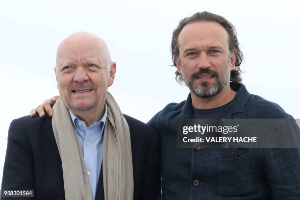 French director Jean-Paul Rappeneau and Swiss actor Vincent Perez pose on May 14, 2018 during a photocall for the film "Cyrano de Bergerac" at the...