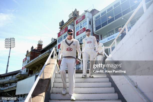 Morne Morkel of Surrey makes his way out to field at the start of day four of the Specsavers County Championship Division One match between Surrey...