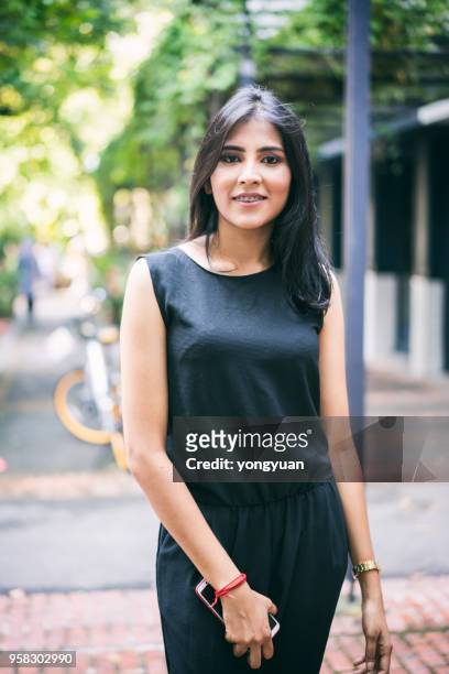 confident indian girl - yongyuan stock pictures, royalty-free photos & images