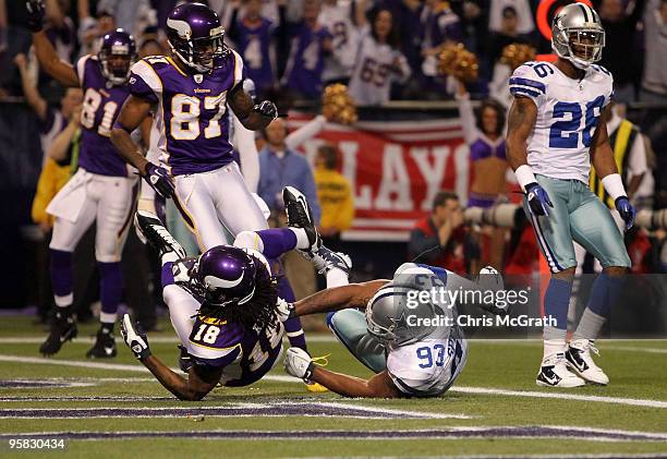 Wide receiver Sidney Rice of the Minnesota Vikings scores a touchdown in the second quarter against Anthony Spencer of the Dallas Cowboys during the...