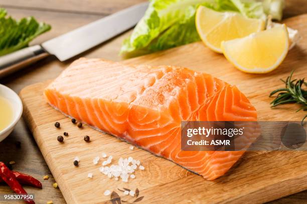 raw salmon steak - omega 3 fish stock pictures, royalty-free photos & images