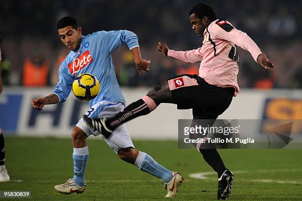 Walter Gargano of Napoli and Fabio Simplicio of Palermo compete for the ball during the Serie A match between SSC Napoli and US Citta di Palermo at...