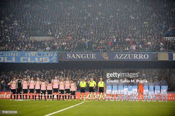Players observe one minute of silence in memory of Haiti hearthquake victims before the Serie A match between SSC Napoli and US Citta di Palermo at...