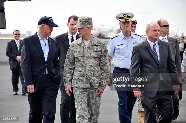 In this handout image provided by the U.S. Coast Guard, Vice President Joe Biden walks and talks with U.S. Air Force General Douglas Fraser,...