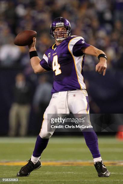 Quarterback Brett Favre of the Minnesota Vikings throws a pass against the Dallas Cowboys during the fourth quarter of the NFC Divisional Playoff...