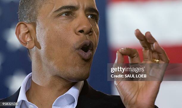 President Barack Obama speaks during a campaign rally for US Senate candidate Democrat Martha Coakley at the Cabot Center at Northeastern University...