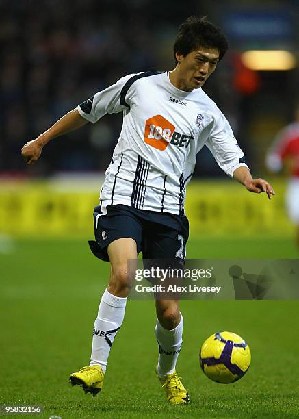 Chung-Yong Lee of Bolton Wanderers in action during the Barclays Premier League match between Bolton Wanderers and Arsenal at the Reebok Stadium on...