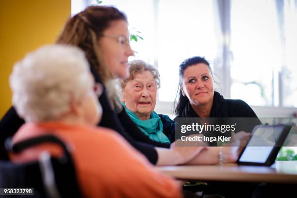 Carers in conversation with residents of a nursing home on April 27, 2018 in Berlin, Germany.