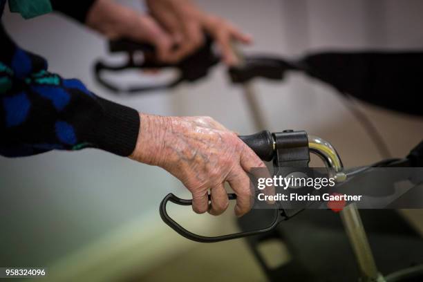 Hands of an old woman on a rollator on April 27, 2018 in Berlin, Germany.