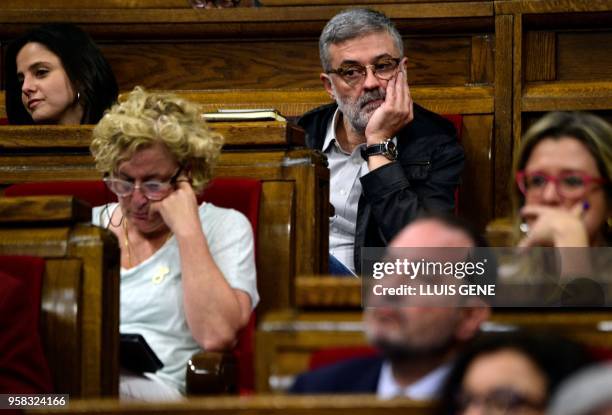 Catalan pro-independence anticapitalist party "Candidatura d'Unitat Popular - CUP" MP Carles Riera attends a vote session to elect a new regional...