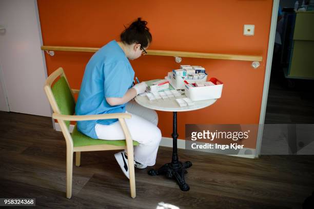 Employee of a nursing home during work on April 27, 2018 in Berlin, Germany.