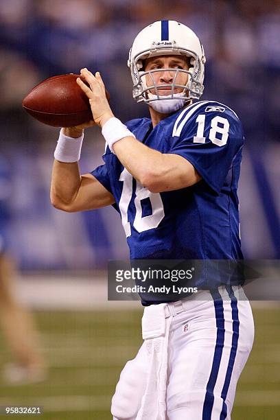 Quarterback Peyton Manning of the Indianapolis Colts thows the ball against the Baltimore Ravens during the AFC Divisional Playoff Game at Lucas Oli...