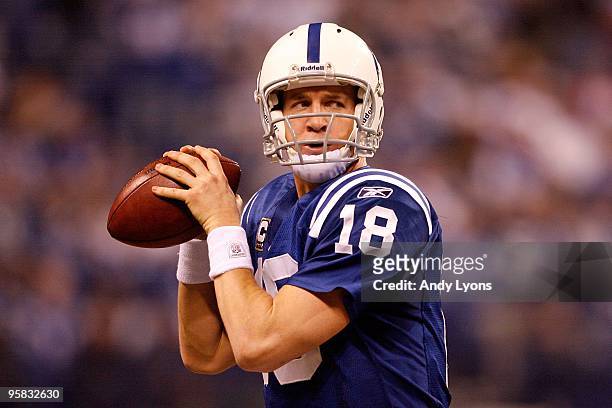 Quarterback Peyton Manning of the Indianapolis Colts thows the ball against the Baltimore Ravens during the AFC Divisional Playoff Game at Lucas Oli...